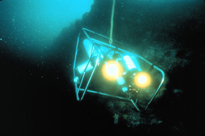 PHANTOM S2, an undersea remote explorer, dives the face of a reef wall.