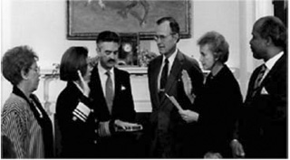 A photograph of Dr. Antonia Novella being sworn in as the Surgeon General of the United States. 